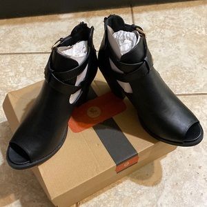 Size peek toe bootie with gold buckle detail